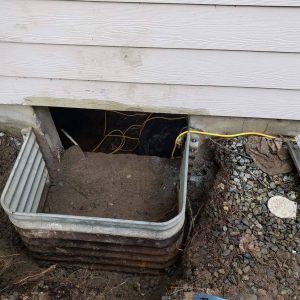 After progress of  digging and remounting crawlspace  well to foundation of home by Sasquatch pest control