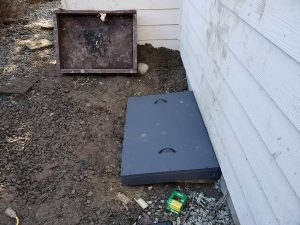 Custom crawldoor built by Sasquatch Pest Control as part of Rodent Exclusion services