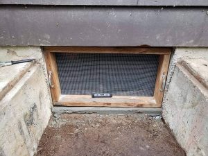 New crawlspace door screen done by Sasquatch pest control for rodent exclusion service